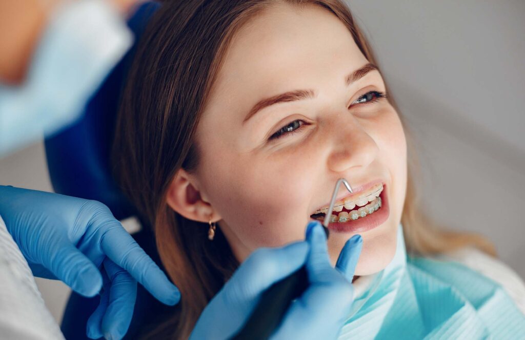 Cute girl taking care of his teeth