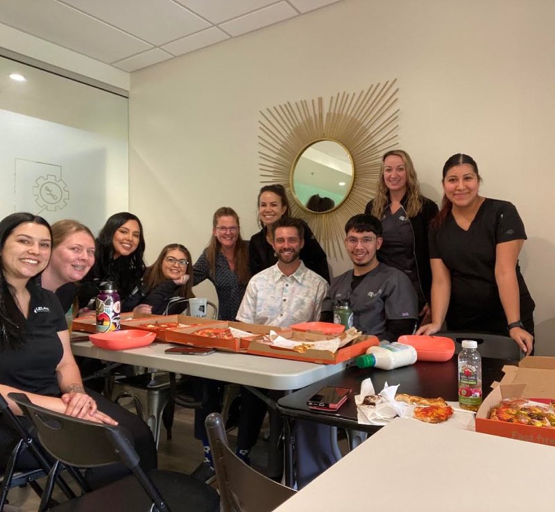 Dr. Andrew J. Leland with his happy team member