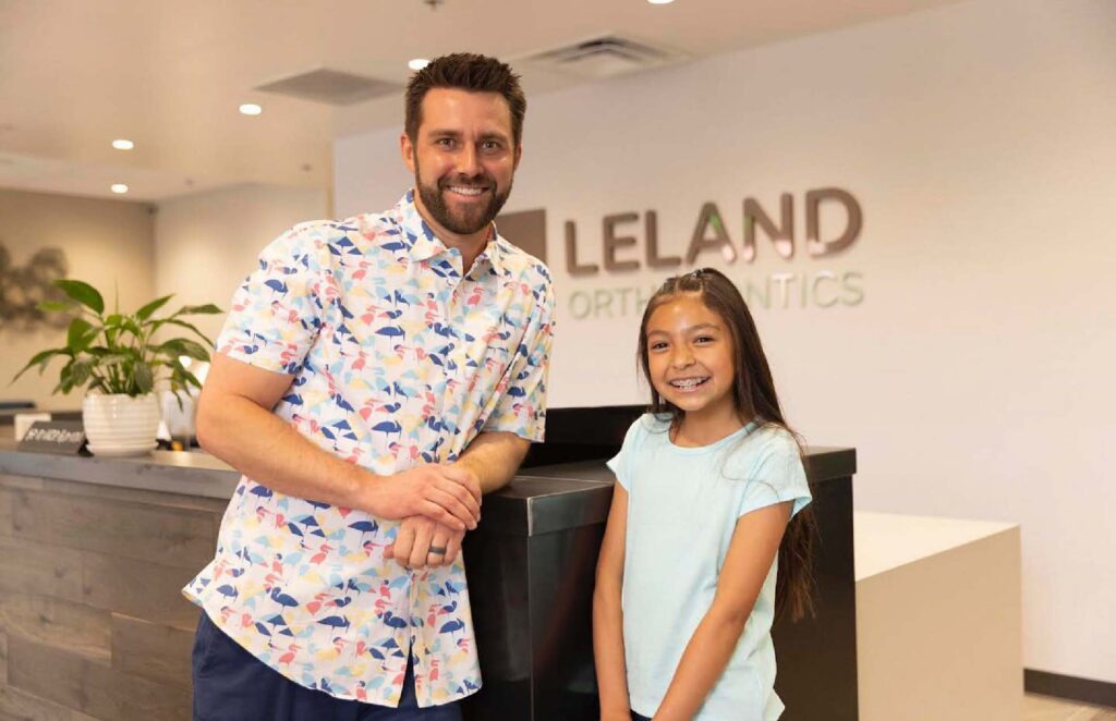 Dr. Andrew J. Leland with a kids