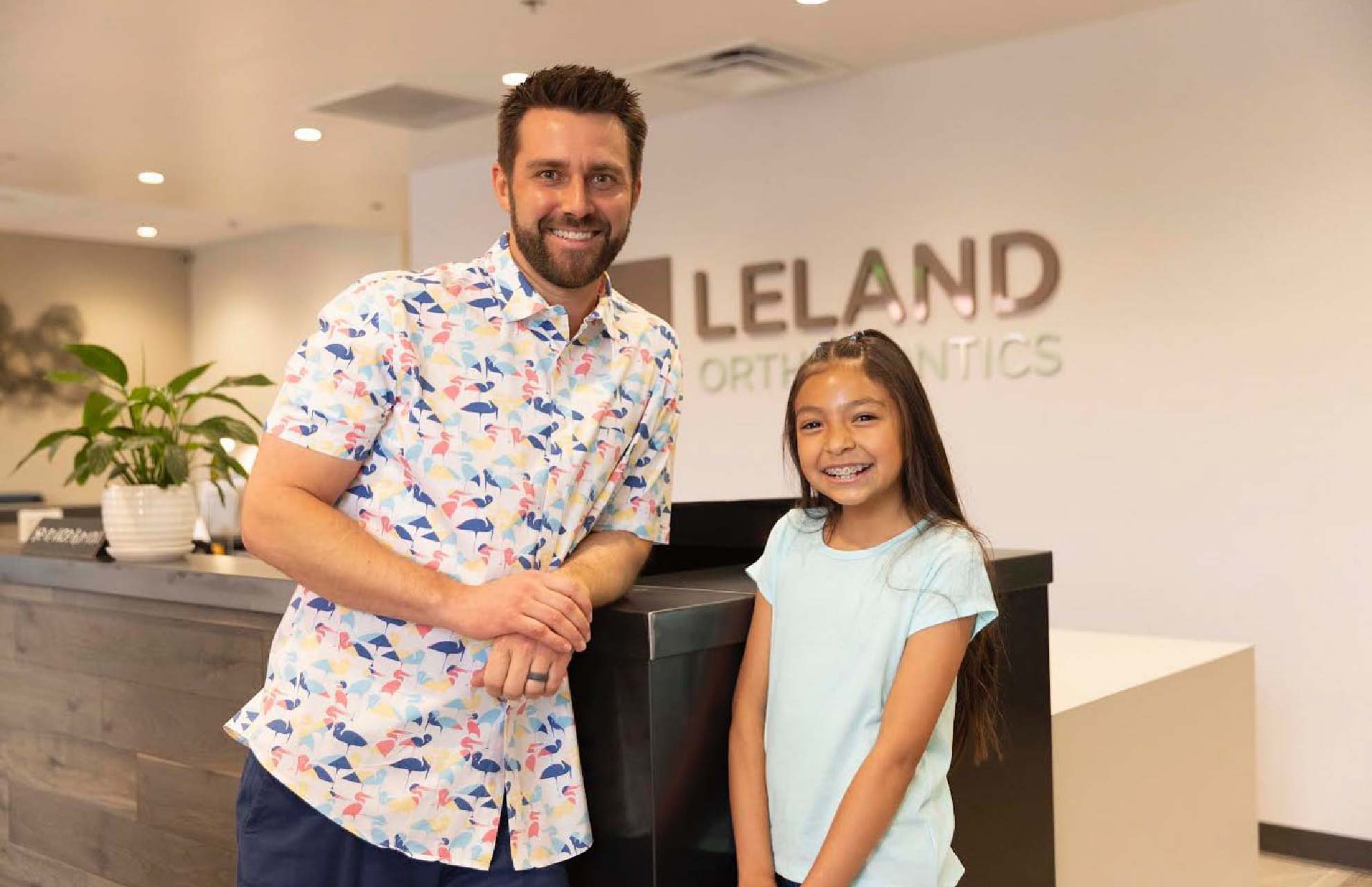 Dr. Andrew J. Leland with a kids